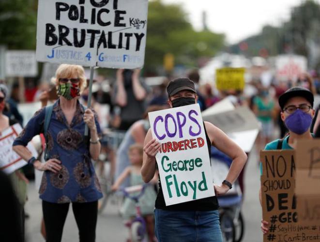 Biểu tình bùng phát thành bạo động tại Mỹ sau sai lầm của viên cảnh sát Minneapolis Ảnh 4