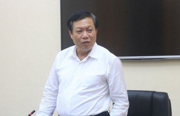 TP.HCM họp khẩn về ca nghi nhiễm là nhân viên sân bay Tân Sơn Nhất - Ảnh 1.