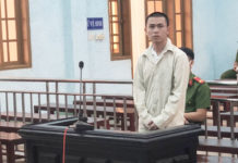  Bị cáo Phan Lê Hoài Sơn tại phiên tòa. Ảnh: R